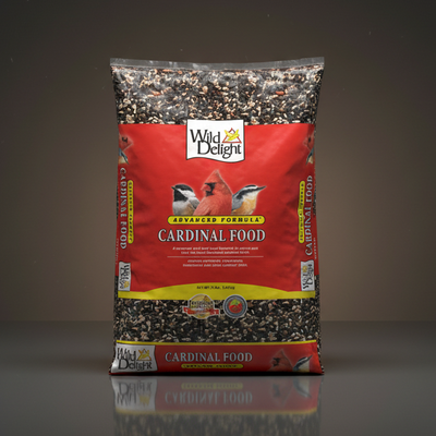 Bag of Wild Delight Cardinal Food on a reflective surface with a dark background